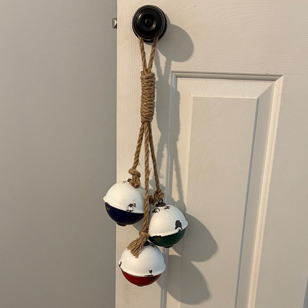 Rustic Hanging Bell Decor with Red, Blue, and Green Accents